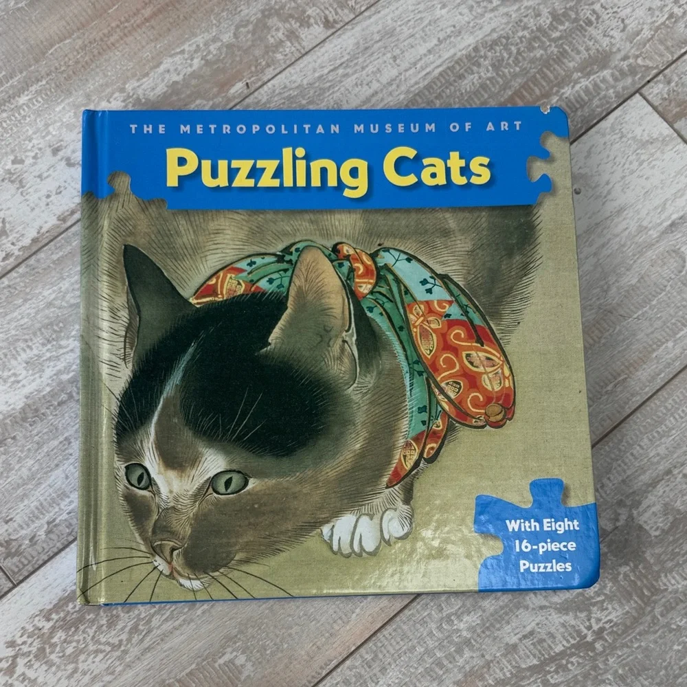 The Metropolitan Museum of Art Puzzling Cats Book: With Eight‎ 16-piece Puzzles